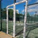 Protector de puerta con 2 huecos de pista de pádel