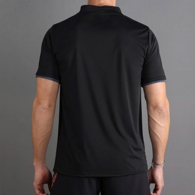 Polo Endless Bravery negro naranja