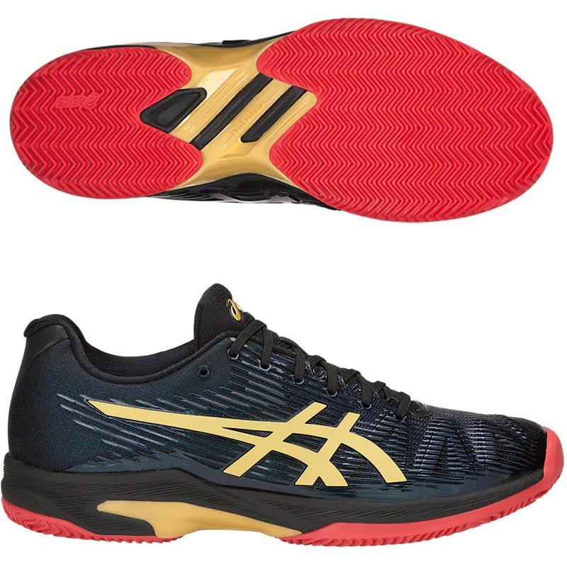 asics negras y doradas